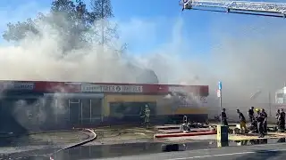 100 firefighters douse wind-driven flames at Sacramento tire shop