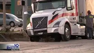 18-wheeler stuck in sinkhole