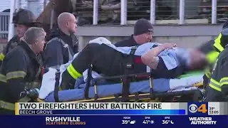 2 firefighters hurt battling fire