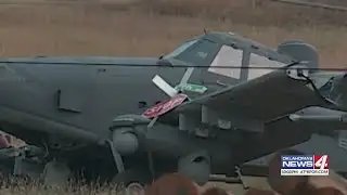 2 people escape injury after Air Force plane crashes in field