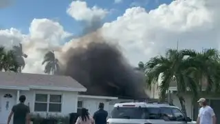 2 vehicles catch fire after utility pole collapses in Lighthouse Point (Courtesy: Renee Board)