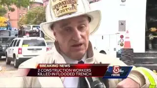 2 workers killed after getting trapped in flooded trench