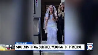 400 students throw surprise wedding for beloved principal