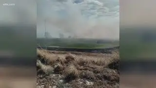 A brush fire burned multiple acres behind a Lexington County high school.
