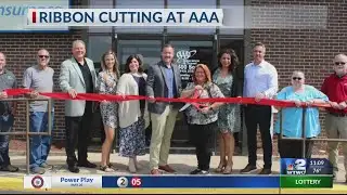 After repairs, AAA office holds ribbon cutting