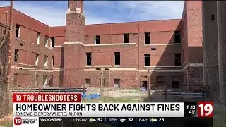 Akron man asks for change at Goodrich Middle School