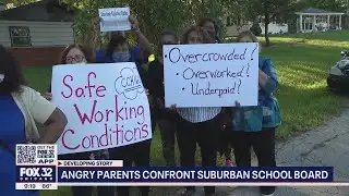 Angry parents confront suburban Chicago school board