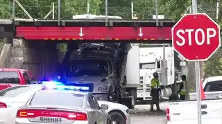 Another truck gets stuck under infamous Olive Road bridge