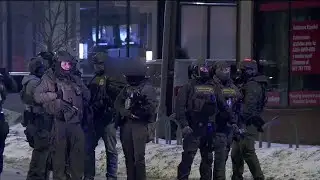 Anti-ICE protesters clash with law enforcement outside hotel in Minneapolis