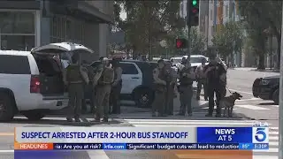 Armed man arrested after 2-hour Metro bus standoff
