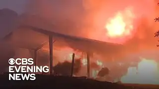 At least 2 dead as wildfires rage through California