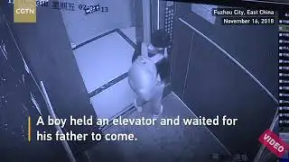 Boy Uses Umbrella to prevent elevator from closing ll ss collection ll