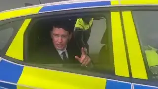 Breaking news. ENOCH Burke arrested again. 