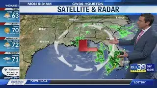 Breezy Monday with spotty light rain in the morning