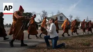 Buddhist monks and their dog captivate Americans while on peace walk