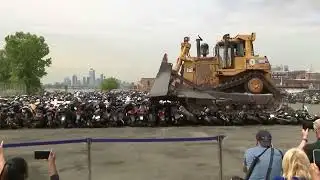 Bulldozer crushes illegal dirt bikes in New York City