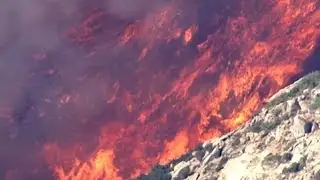 Calif. brush fire forces summer camp evacuation