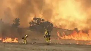 California firefighters struggle to get wildfires under control