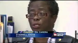 Camera captures a teacher getting pushed down the stairs by a student