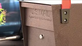 Camera captures envelopes being removed from church