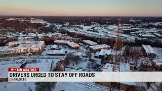 Charlotte sees record snowfall; drivers asked to avoid roads