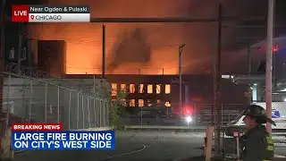 Chicago firefighters battle extra alarm blaze at West Side building