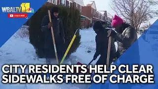 City residents help clear sidewalks of snow, ice for free