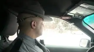 Clearing snow off your car before driving