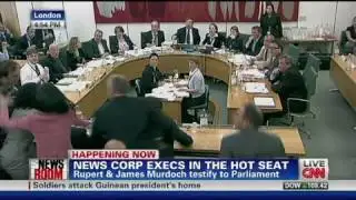 CNN: Man attacks Rupert Murdoch during hearing