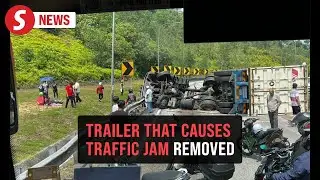 Container truck removed after accident causes hours of traffic snarl