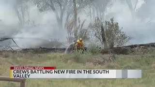 Crews battle fire in the South Valley