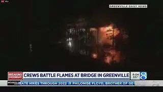 Crews battle flames at bridge in Greenville