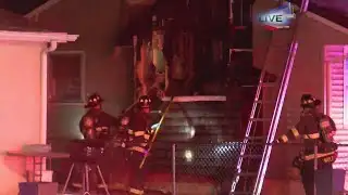 Crews battle flames at house fire