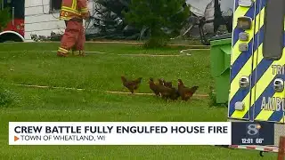 Crews battle fully engulfed house fire in rural De Soto