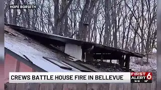Crews battle house fire in Bellevue