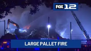 Crews battle large pallet fire in North Portland
