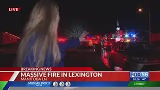 Crews battle Lexington garage fire