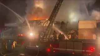 Crews battle massive 4-alarm fire at Macadam Center