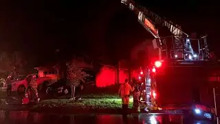 Crews fight huge house fire in Titusville