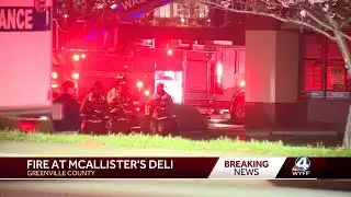 Crews investigating fire at Upstate business