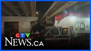 Crews pulling stolen Tesla out of the Bow River
