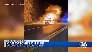 Crews rush to put out car caught on fire
