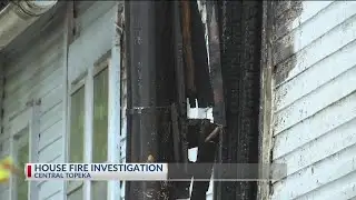 Crews work house fire in central Topeka