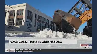Crews work to clear roads in Greensboro