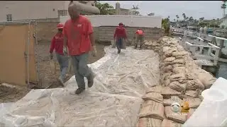 Crews Work To Shore Up Seawall That Was Torn Down By Mistake