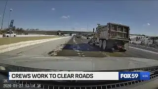 Crews working to clear roads after snowfall