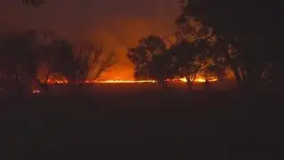 Crews working to contain massive brush fire on Southside