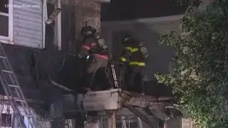 Crews working to knock down a house fire on SE side