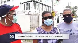 CUBAN NATIONALS PROTEST EMBASSY TO RETURN HOME