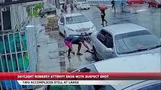 DAYLIGHT ROBBERY ATTEMPT ENDS WITH SUSPECT SHOT